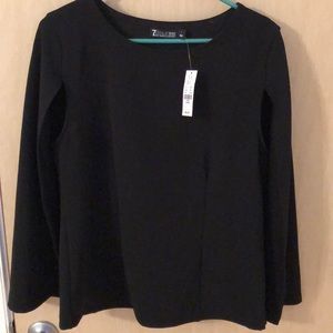 Black sleeveless top with attached cape